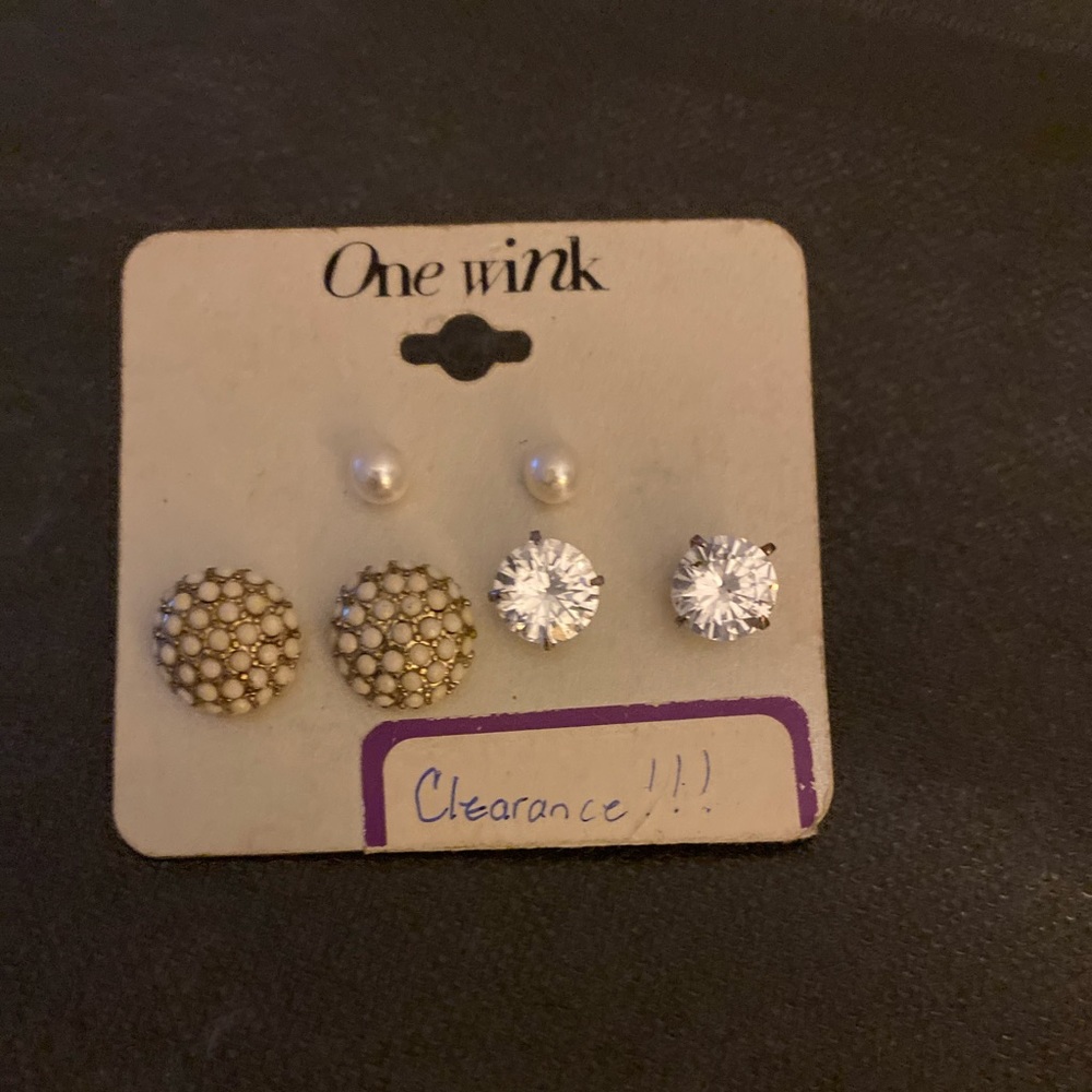 Stud three pair of earrings